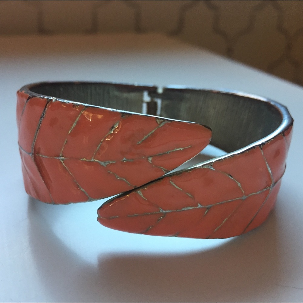 Pink feather cuff bracelet.